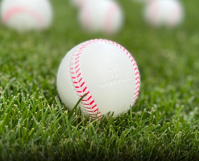 Tater baseball in grass